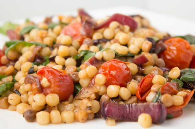 Fregula with charred onions and cherry tomatoes