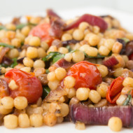 Fregula with charred onions and cherry tomatoes